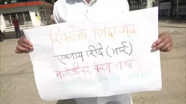 Shiv Sena men staged a protest in front of Radisson Blu with poster